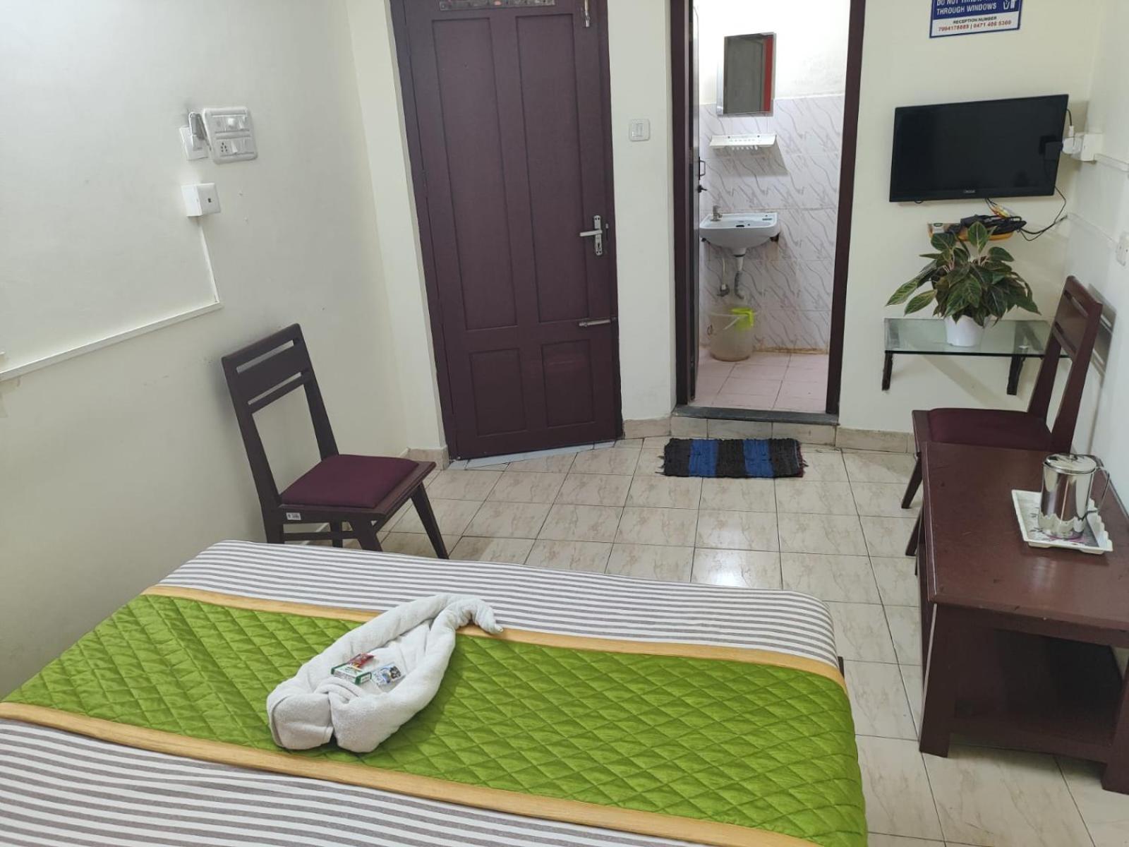 Hotel Gamas Inn Thiruvananthapuram Екстер'єр фото